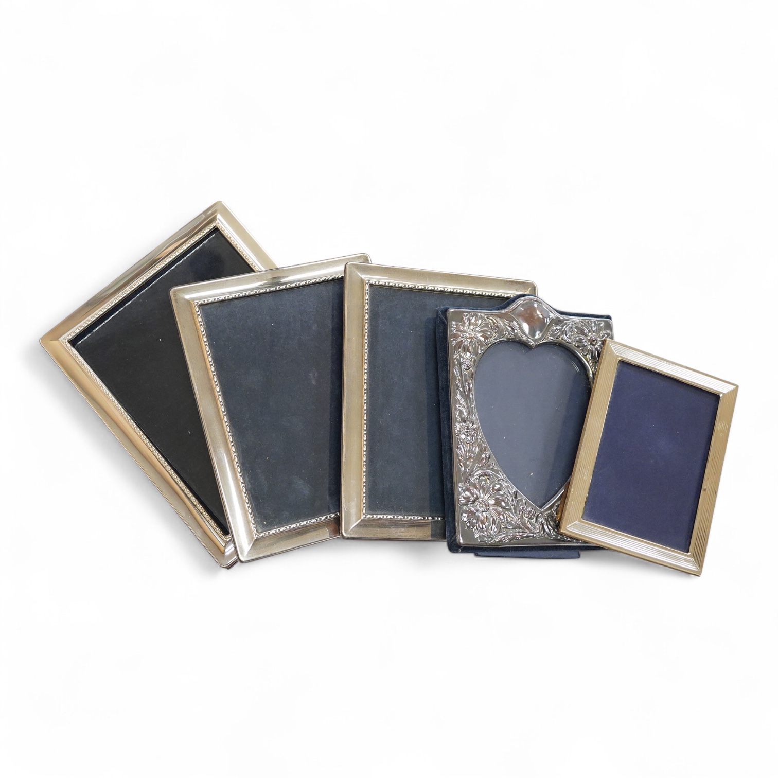 A pair of modern silver mounted photograph frames, 20.8cm and matching larger frame, 23.2cm, by Carr's of Sheffield, Ltd, Sheffield, 1996, together with one other modern silver mounted photograph frame and a similar Ital